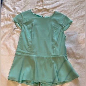 Express turquoise peplum top. Size medium.